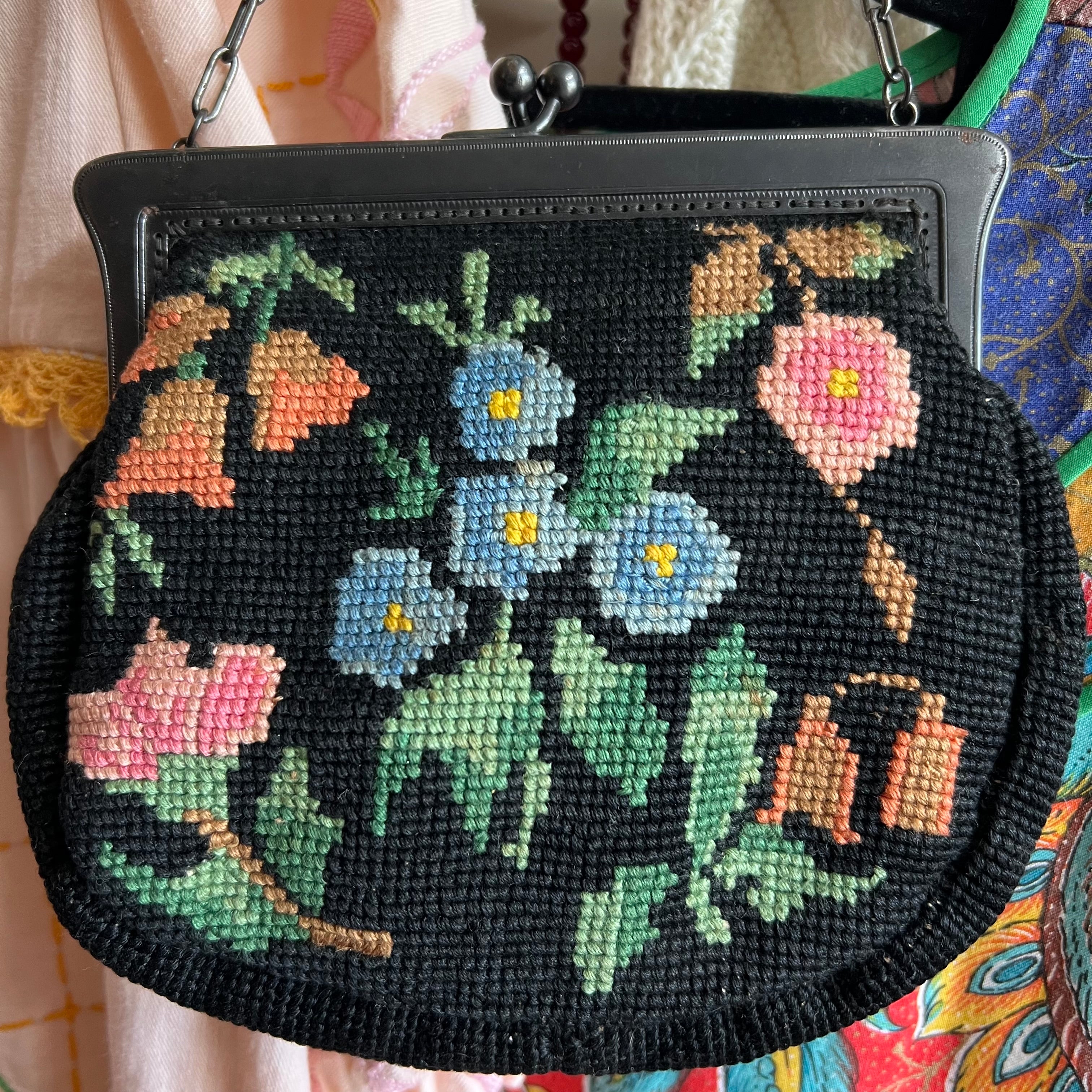 VINTAGE, NEEDLEPOINT store HANDBAG. BLACK BACKGROUND WITH GORGEOUS DISPLAY OF FLOWERS